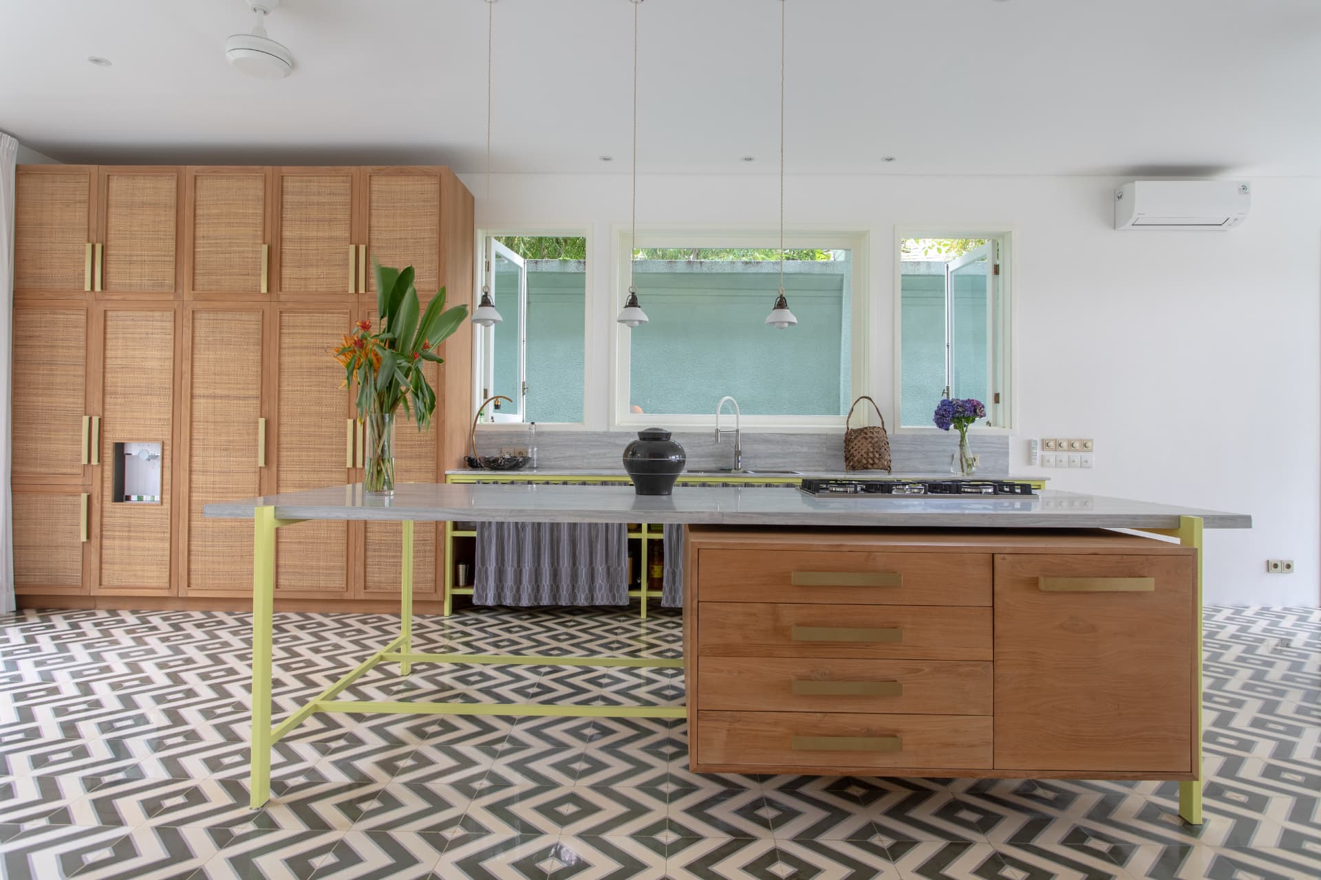 Ubud 2 — kitchen island with stone top and patterned tile