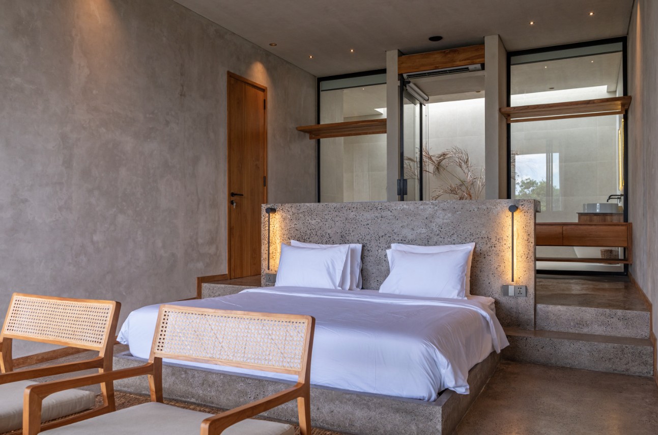Pererenan 2 — bedroom with terrazzo plinth and ensuite