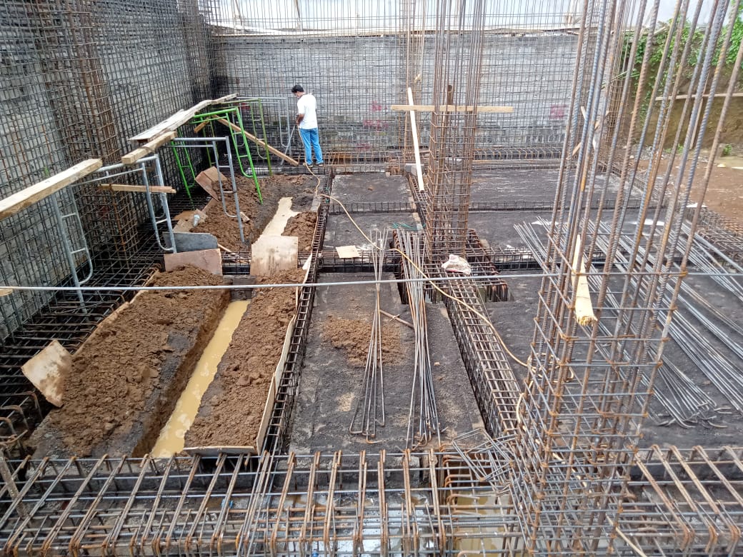 Reinforcement and formwork on a concrete slab