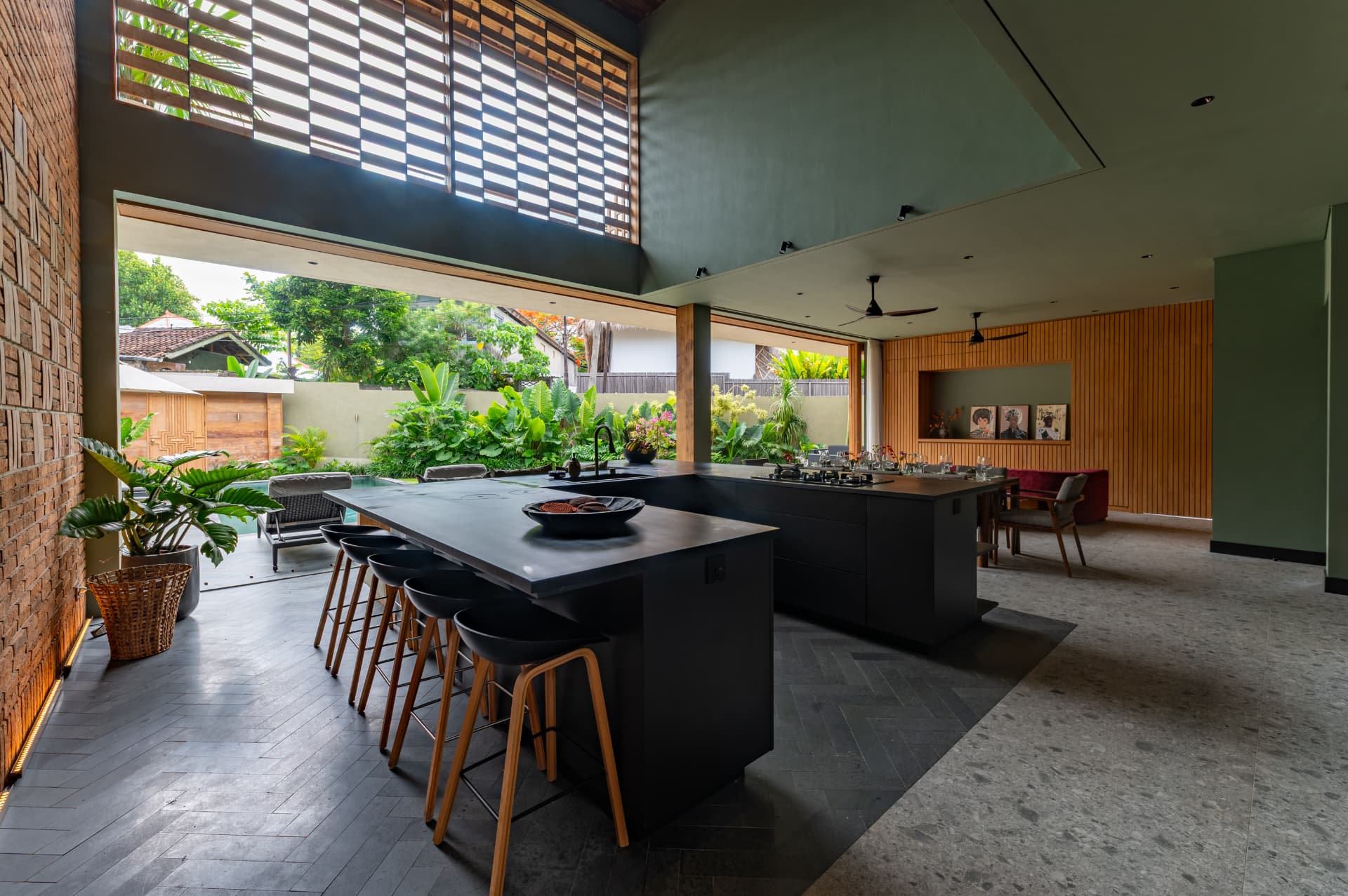 Umalas 1 — open kitchen island opening onto the pool deck