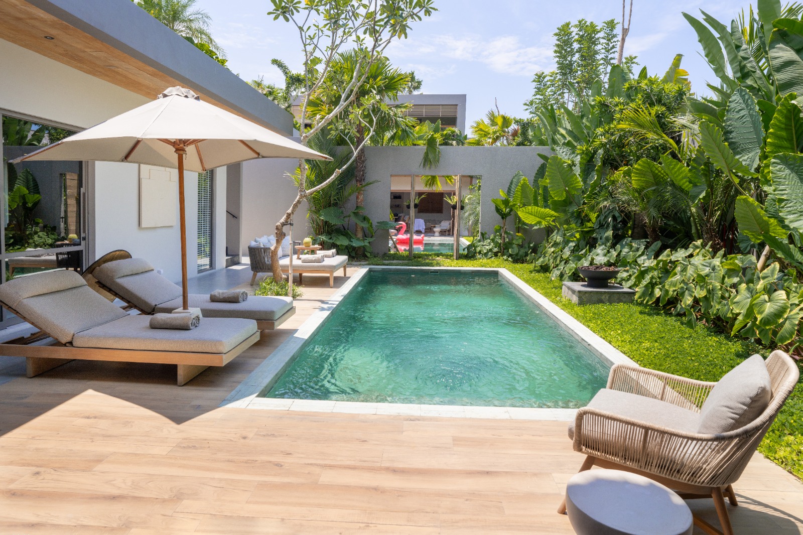 Sin Nombre Bali — pool courtyard with timber deck