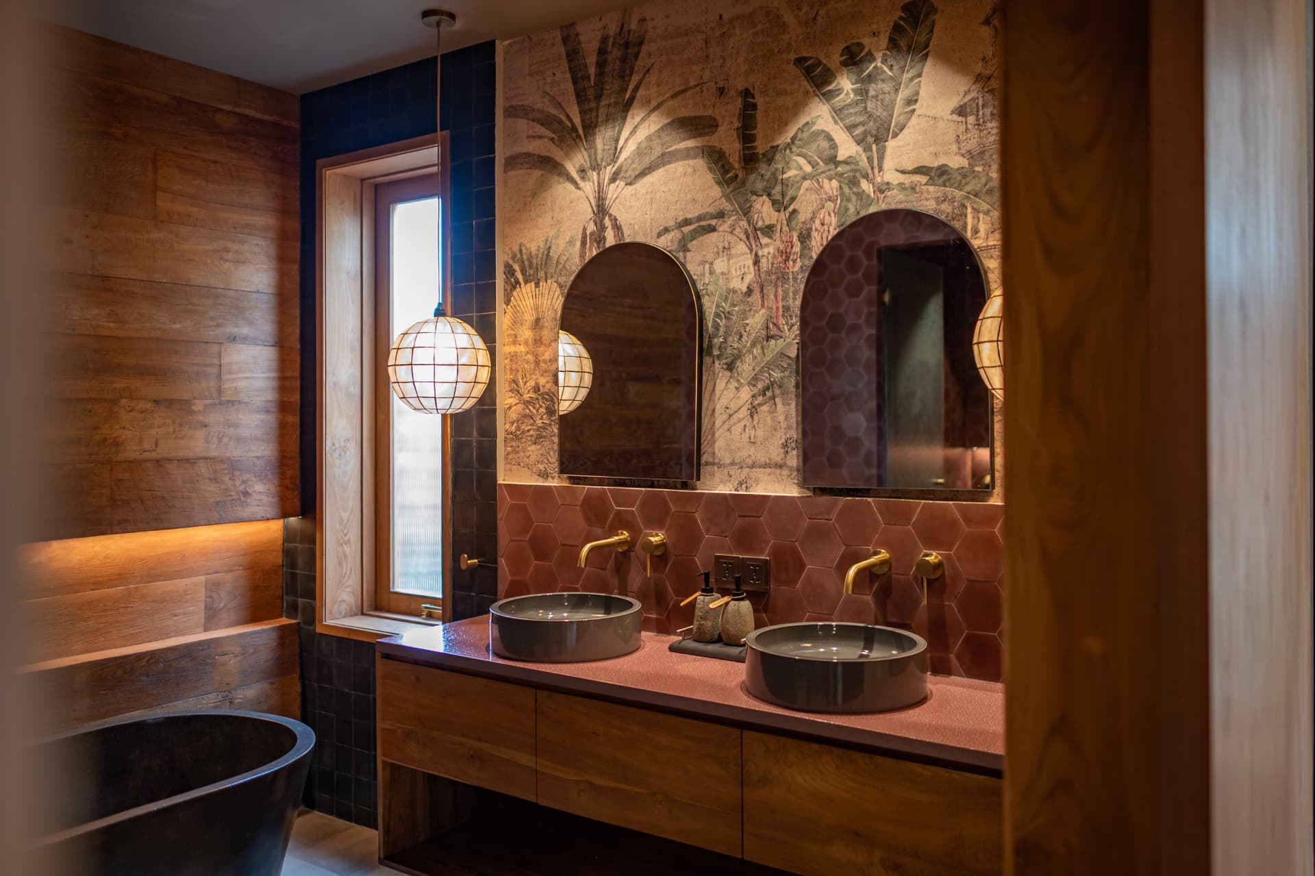 Bathroom with hexagonal terracotta tile and twin basins